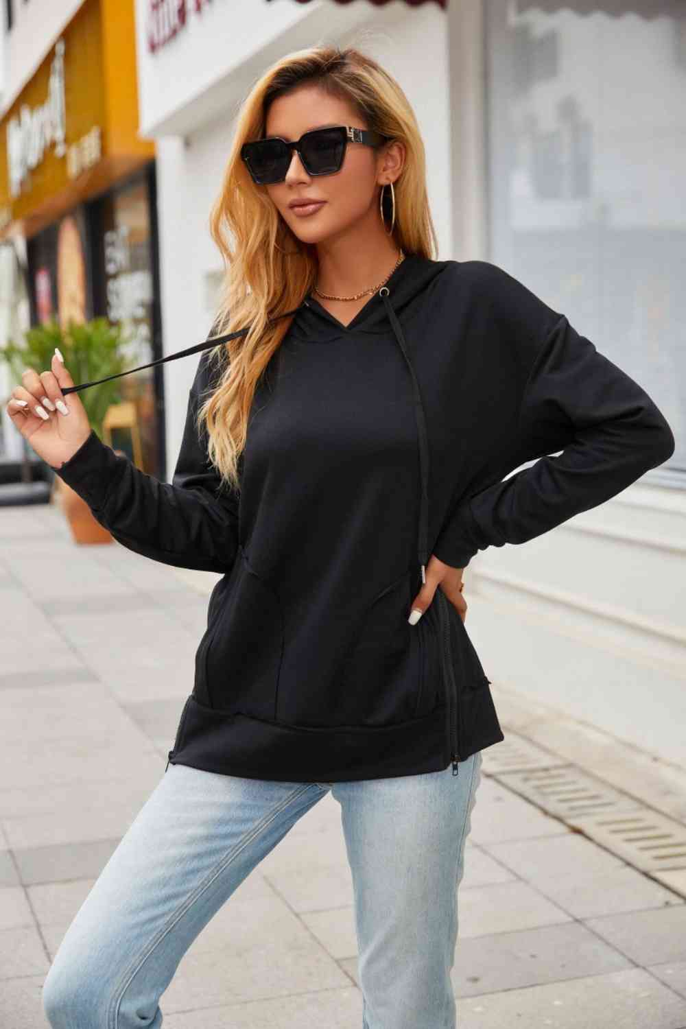 Sudadera con capucha y cordón con detalle de cremallera