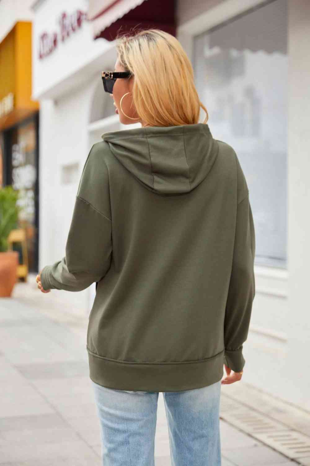 Sudadera con capucha y cordón con detalle de cremallera