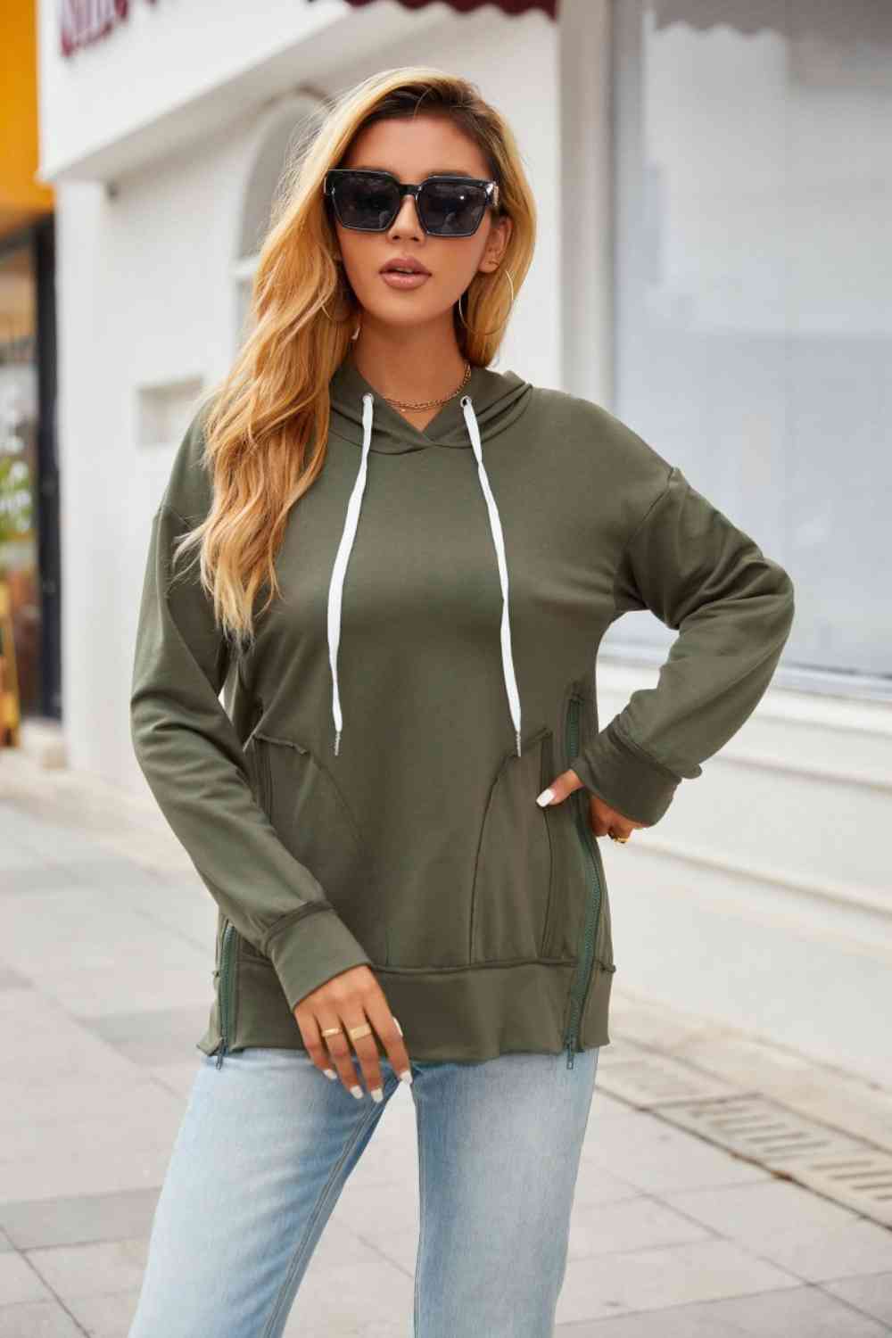 Sudadera con capucha y cordón con detalle de cremallera