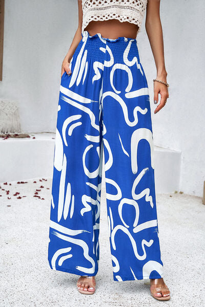 Pantalones anchos con estampado fruncido y bolsillos