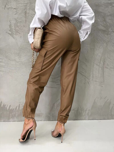 Pantalones de cintura alta atados con bolsillos