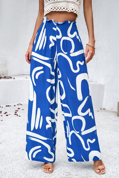 Pantalones anchos con estampado fruncido y bolsillos