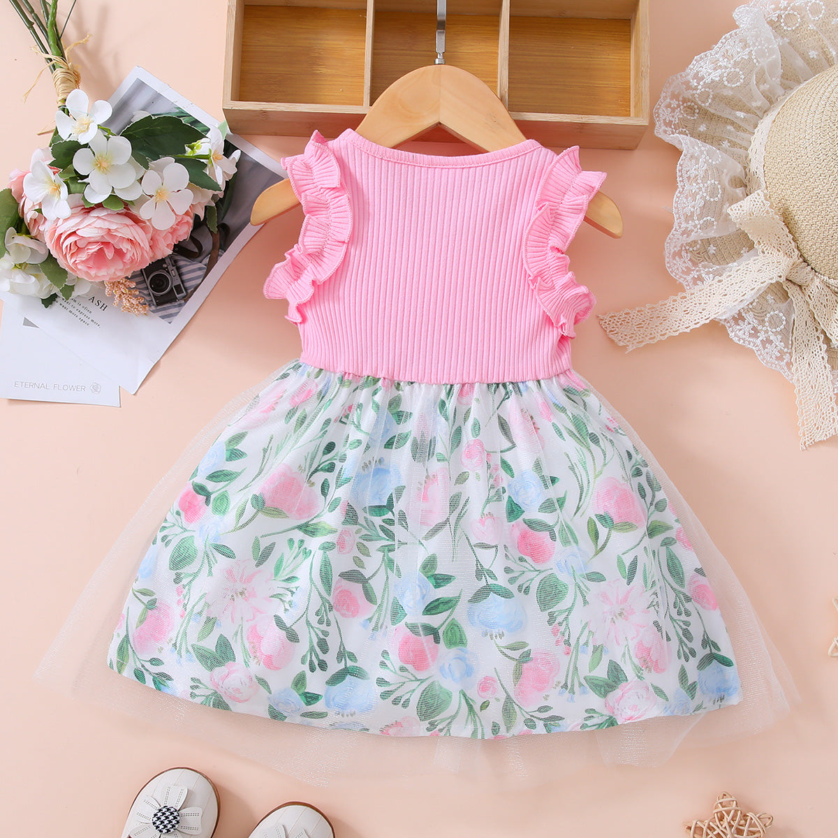 Vestido bebé niña con detalle de lazo floral