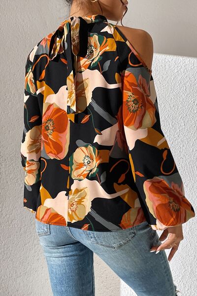 Blusa floral con hombros descubiertos y manga globo