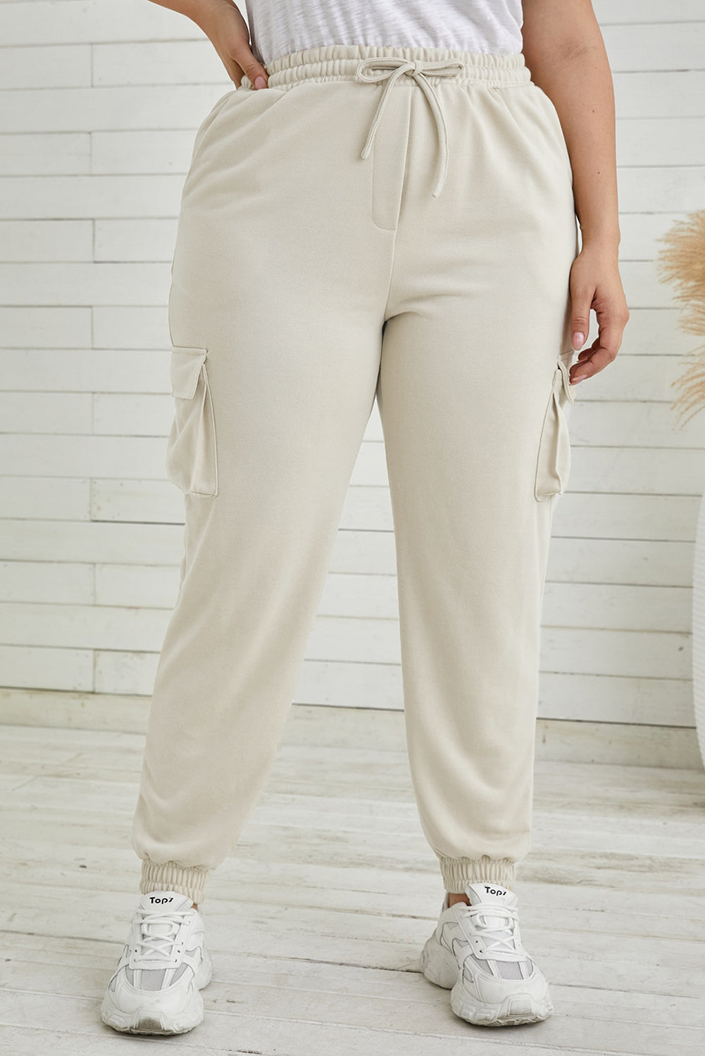 Joggers con cintura elástica y bolsillos de talla grande