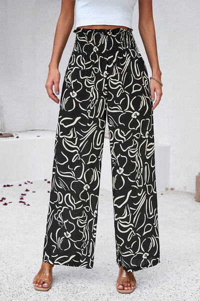 Pantalones anchos con estampado fruncido y bolsillos