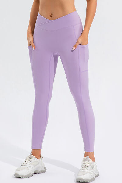 Leggings activos de cintura alta con bolsillos