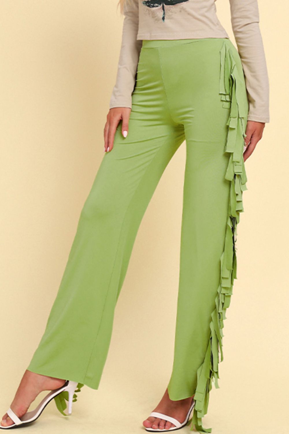 Pantalones anchos con ribete de flecos