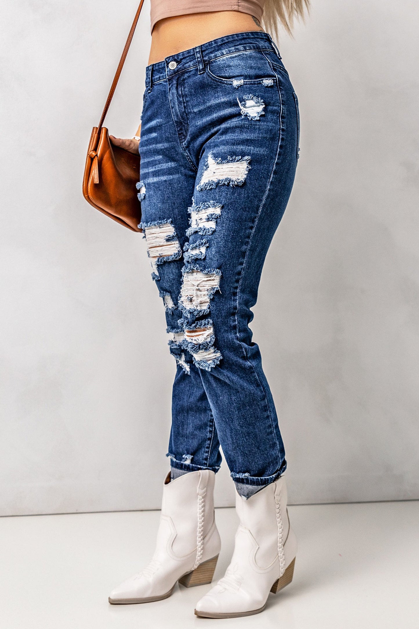 Jeans desgastados de cintura alta con bolsillos