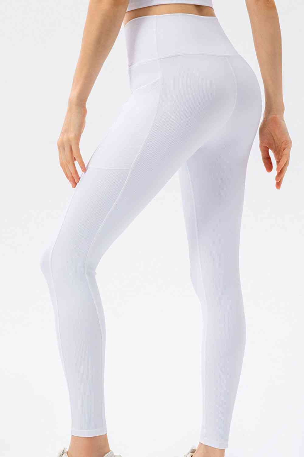 Pantalones deportivos largos ajustados con cintura en forma de V